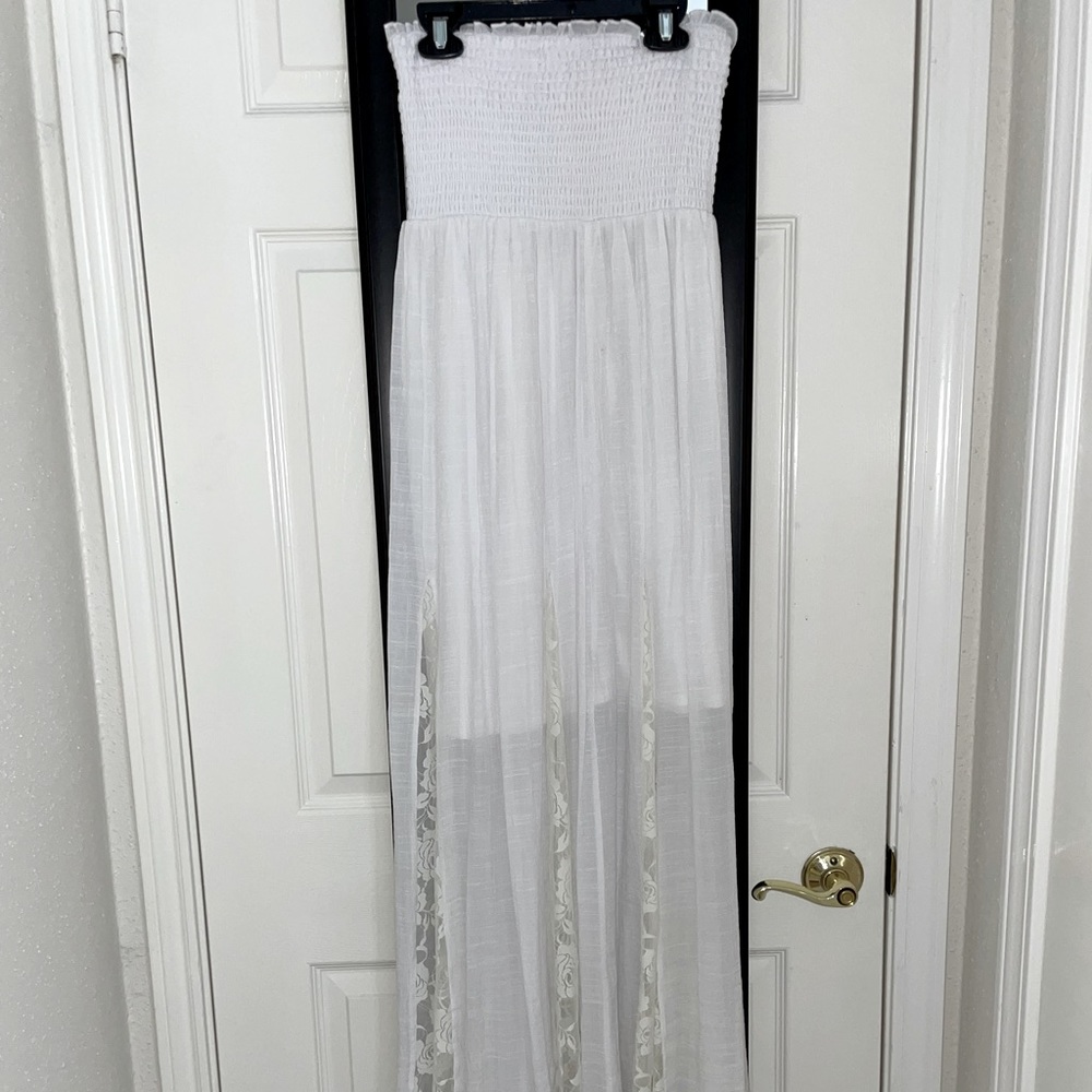 Strapless maxi dress with knee length liner. Also great for a cover up.